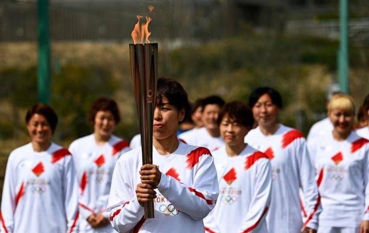 奥运圣火运抵日本(东京奥运会点燃圣火的人)
